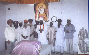 Baba Sukha Singh ji (Sarhali) and sangat in the Darbar Sahib of Gurdwara Pahartali Sahib (Chittagong)..jpg