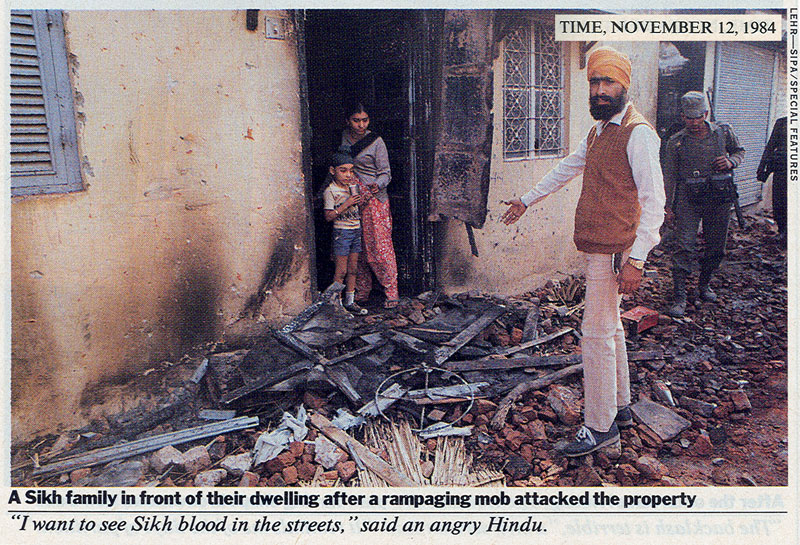 File:Sikh-showing-burned-property-burning-1984-delhi.jpg