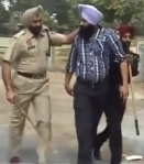 Punjab police, Mohali Superintendent of Police (SP)-Detective Pritam Singh before desecrating young Sikh's turban