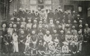 In this detail you can see Udham Singh (standing right at the back).jpg