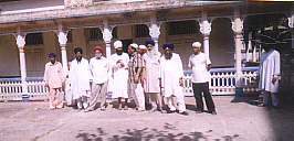 Baba Sukha Singh ji and sangat outside.jpg