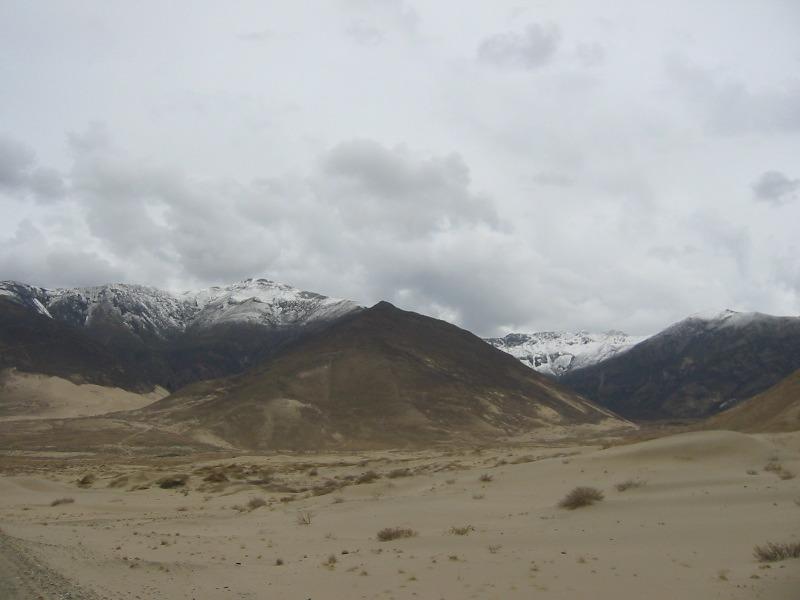 File:Sand dunes and snowy mountains near Samye Monastery.jpg