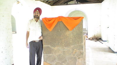 Slab inscription containing name Nanak Acharya.jpeg
