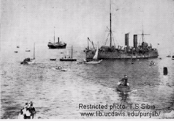 1914. The Komagata Maru in Vancouver harbor, surrounded by police boats.