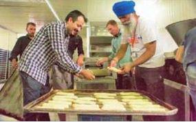 Ravi Singh at bakery.jpg