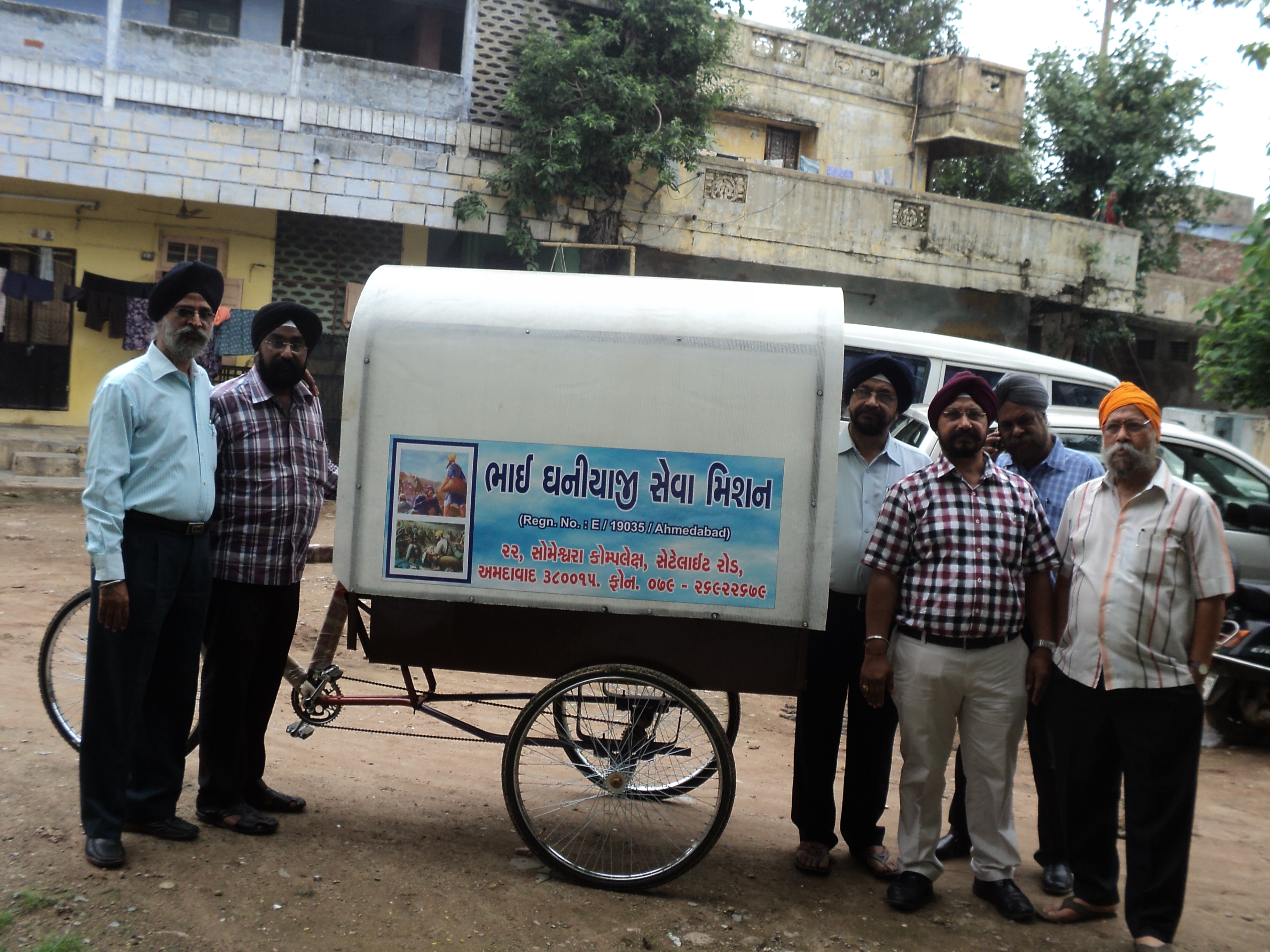 Pictures taken at the auspicious occasion of the Prakash purab (enthronement day) of Sri Guru Granth Sahib on 1 September 2012 - CYCLE RICKSHAW USED AS HEARSE VEHICLE WAS DONATED TO A PHILANTHROPIST MR. MITHALAL LUHANA (MITHAKAKA) WHO IS DEDICATED TO THE YEOMEN SERVICES BY CREMATION