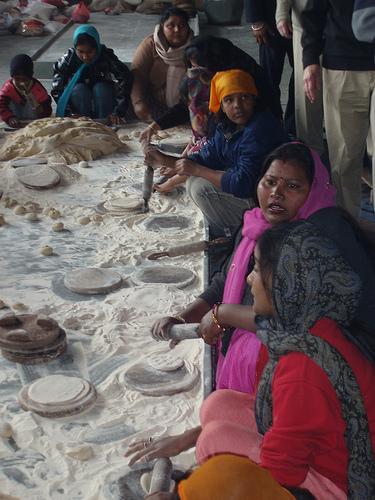 Doing Seva making rotia (chapattis)