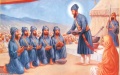 Panj Pyare being blessed with Amrit