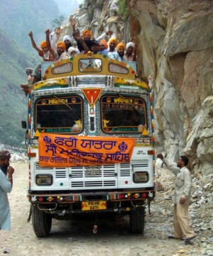 498px-Sikh pilgrims cheering on bus to Manikaran.jpg