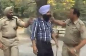 Sikh's turban removed by Punjab police 1.jpg