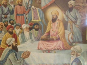 Guru Sahib presenting his belongings to the Sanghera Jatts of Bilga.jpg