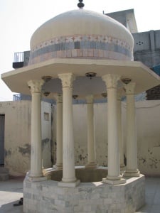 The well outside the small Gurdwara building