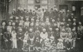 At the celebration of the birth Anniversary of Guru Nanak 1937, the Sangat and committee Members of Gurdwara Shepherds Bush. London. Udham Singh can be seen on extreme top.
