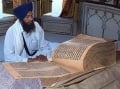 the hand-written Guru Granth Sahib at the Golden Temple, Amritsar